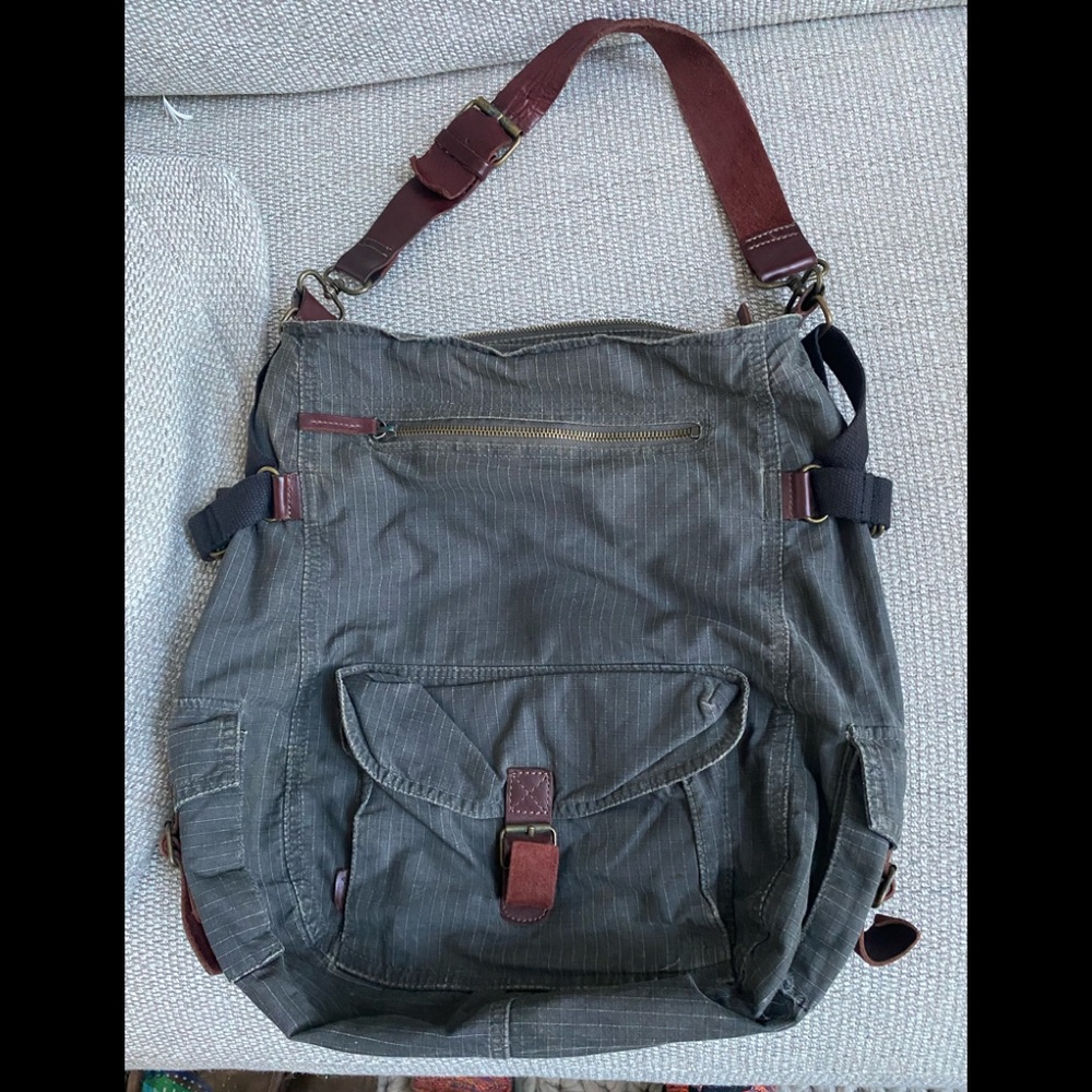 French Connection gray bag with leather strap and adjustment tabs